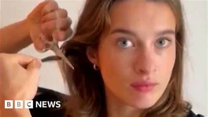 What does it mean when a woman cuts off her hair?